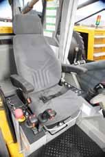 KEY FEATURES OPERATORS CAB Sliding-door cab with large area windows, near and far beam head lamps, and rear-view mirrors allow for high visibility.
