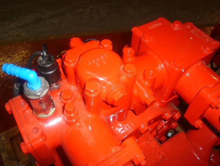 The low pressure manifold is secured to the volute by five bolts.