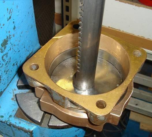 The manual press can also be used to force the piston through the seal arrangement until