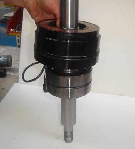 The two bearings left on the shaft will require a press tool to force the shaft away from the bearings.