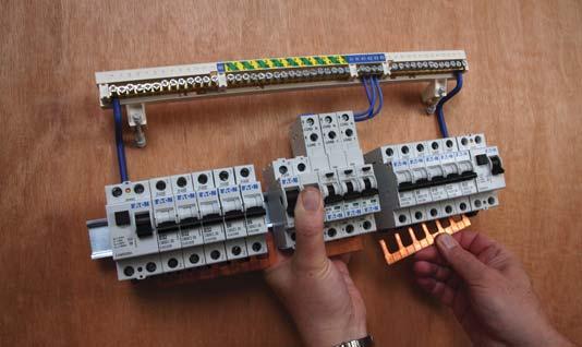 The busbar is then snapped to the required length (split load units only) and fi xed to the device terminals.