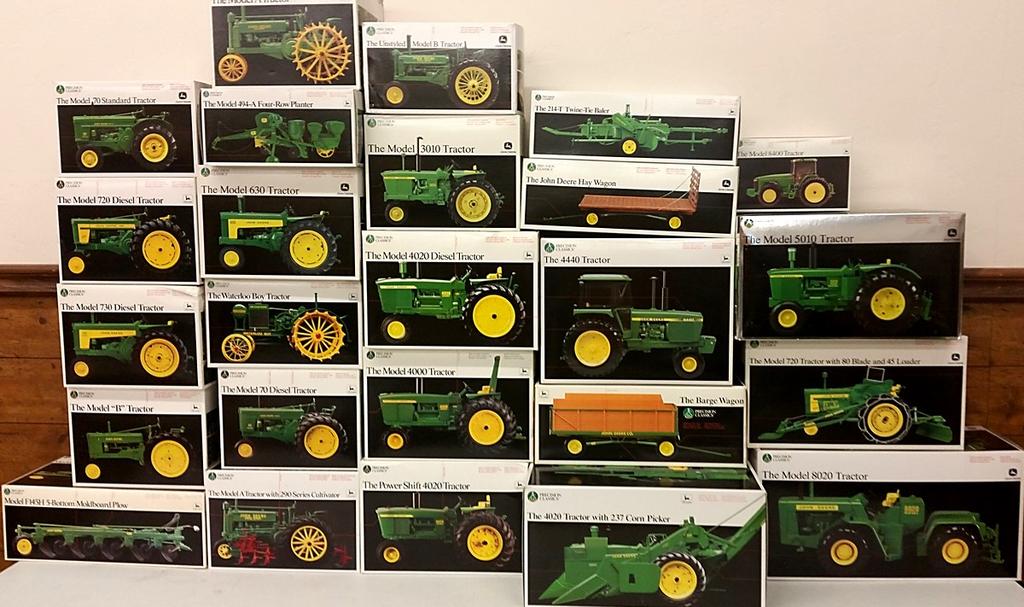 #1 $ Ertl Precision Classics #1 The Model A Tractor on Steel. No. 560 built in 1990 NIB Condition. #2 $ Ertl Precision Classics #2 The Model A Tractor with 290 Series Cultivator. No. 5633 built in 1991 #3 $ Ertl Precision Classics #3 The Model 4020 Diesel Tractor with narrow front.