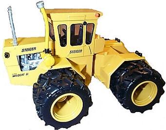 #322 $ Ertl Toy Farmer 1/32 Titan STR-360 4 wheel drive tractor with duals all-around.