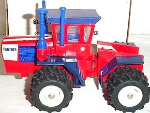 Only 12 were produced by Titan. #323 $ Ertl Toy Farmer 1/32 Big Bud 440 tractor with Triple tires.