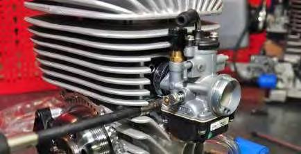 11 Flat Screwdriver Ensure the carburettor is