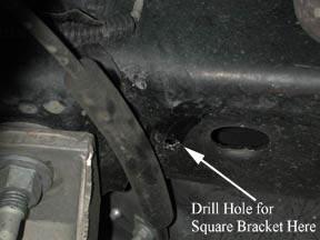 Install 5/16 inch nuts (part #18) from inside the car, make these nuts snug, but do not tighten. Locate the black square tube with stand-offs on each end.