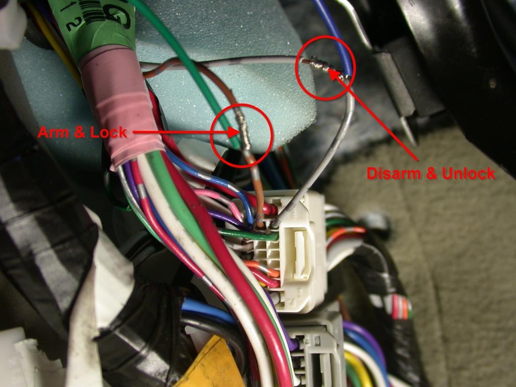 3.03 Wiring location for door locks and factory alarm control: The wires to control the factory alarm and the door locks are located behind the driver s kick panel.