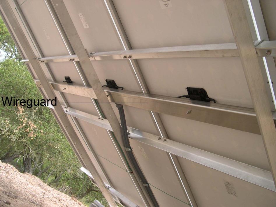 5 m (from finished grade)*; or (4) Enclosing the ground mount PV installation inside a fence**. (*) On sun tracker units the 2.5 m shall be measured when the array is oriented in its lowest plane.