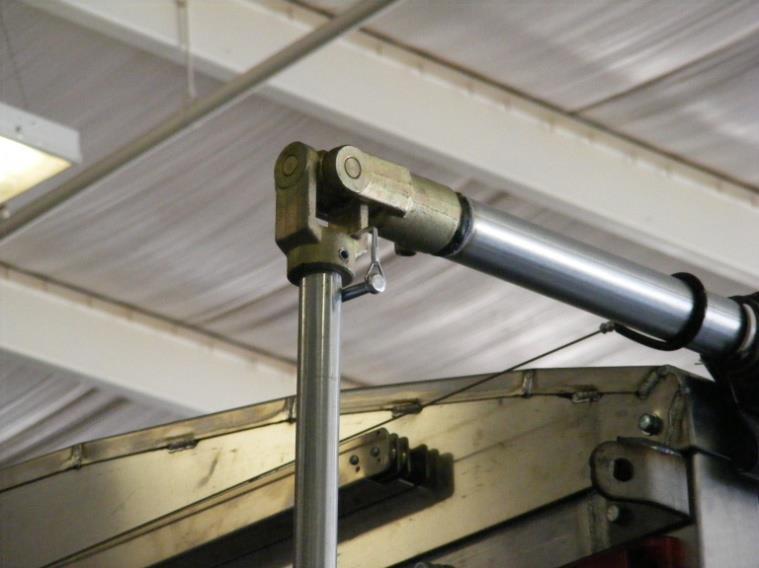 in-place until fully engaged with the roll tube spline. Fig. 12.2 5. Roll the tarp open and closed with the crank handle. 6.
