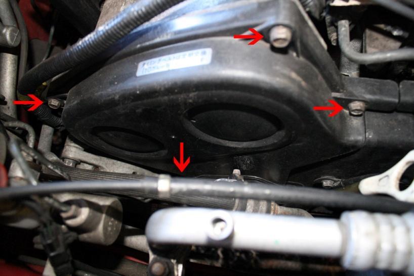 RM 4 bolts holding rear top cam belt cover using 10mm socket.