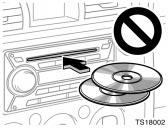 YOUR COMPACT DISC PLAYER (type 1) When you insert a disc, gently push it in with the label side up. The compact disc player will play from track 1 through to the end of the disc.