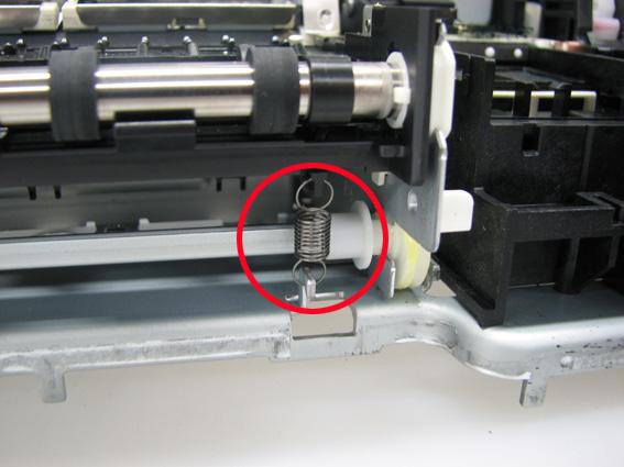 6) Remove the eject roller shaft