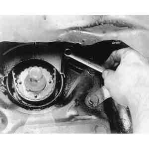 Fig. 7: Align the camshaft pulley mark (A) with the V-notch at