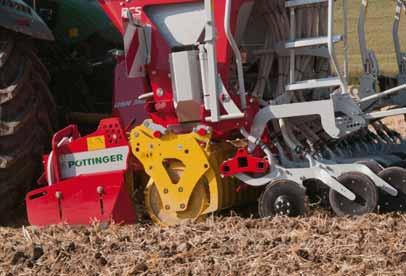 Seed drill and rear rollers are a unit As a result the power harrow can move upwards on stony ground.