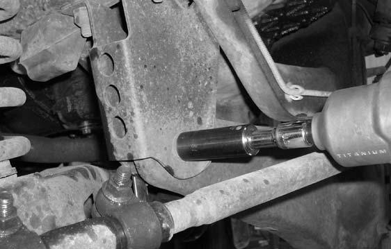 Working on the front driver side twin eye beam axle bracket, remove the stock bracket from