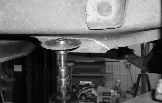 Locate (5) 7/16 x 1 1/2 bolts, (10) 3/8 USS flat washers and (5) 7/16 unitorque nuts from hardware bag R4XRB- attached the stock radius arm bracket to the frame rail. 27.