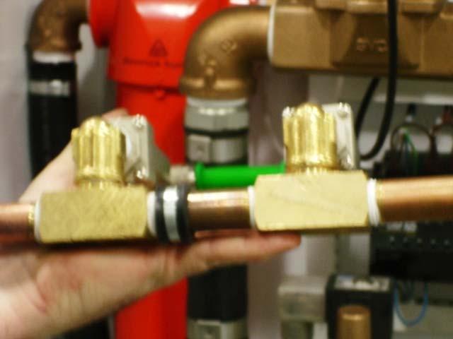 CHECK VALVE CLEANING Using a #2 Phillip s screw