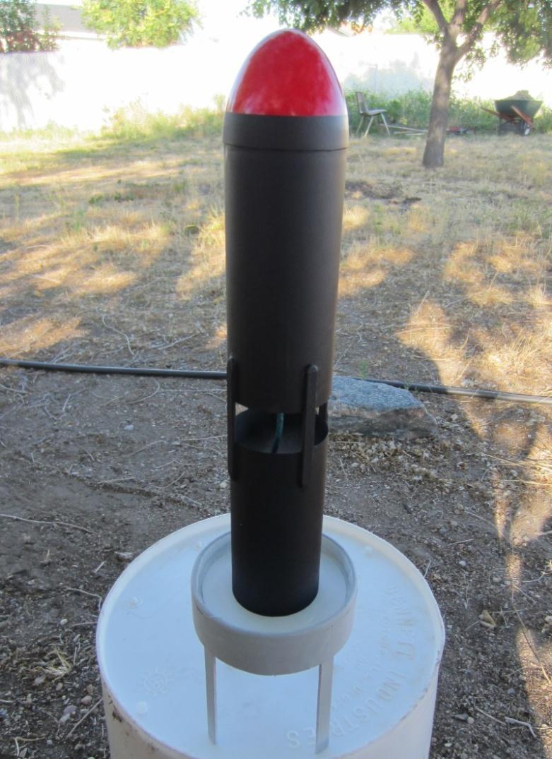 The major elements of a basic induction tube rocket are a forward body tube, an aft body tube, and a forward engine mount, all seen here. The open intake is between the fore and aft body tubes.