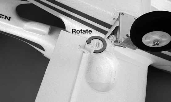 4. Rotate the retainer to lock the wing. 3.