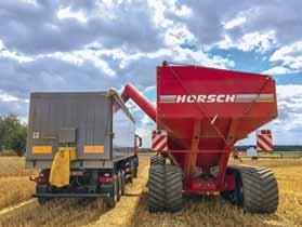Thus, stability is increased and soil pressure reduced as the tyres of the auger waggon do not run in the tractor tracks.