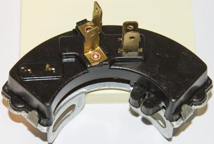 While holding the back of the neutral safety switch towards you, align the slotted tab with the first hole from the left. This is the neutral position in the switch.