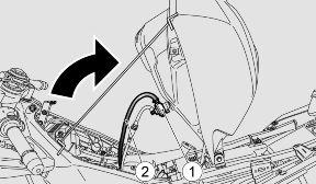 Remove the passenger saddle and collect the supporting rod of the fuel tank. Lift the tank stopping it with the correct positioning of the supporting rod, in the appropriate seats. HANDLE WITH CARE.