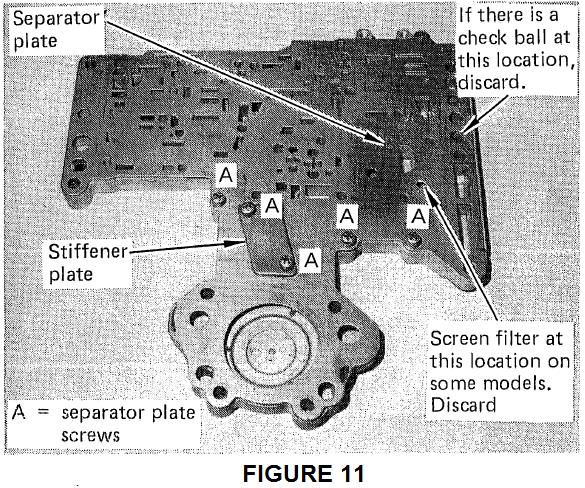Install stiffener plate and retaining screws and tighten screws finger tight. STEP 10. Install pressure regulator valve into its bore. (See Fig. 10) Install converter valve into its bore.