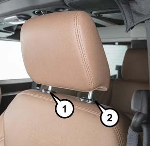 GETTING TO KNOW YOUR VEHICLE Head restraints should never be adjusted while the vehicle is in motion.