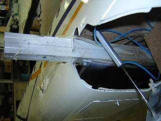 fuselage on each side Screw the steel ball link on the hinge Screw the link to
