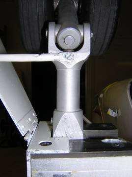 door to the strut with plastic ball link and