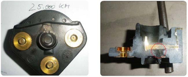 The left image below shows the rear of the distributor, revealing the outlet for the high voltage, while the right image