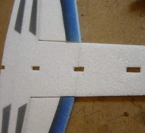 aileron servo and with glue as shown below.