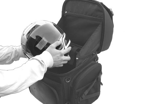 MAIN STORAGE COMPARTMENT (continued): When placing a helmet inside of the main compartment, set it with the base of the
