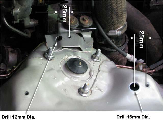 Drill a pilot hole at each of the two marked positions.
