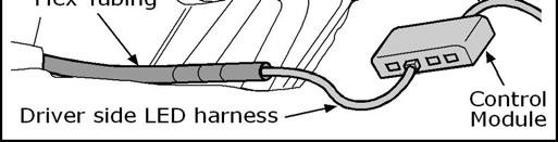 Fig. 30 30. Route the harnesses under the center stack, making sure to pass over the HVAC drain tube.