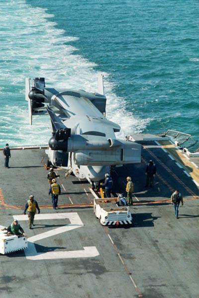 When the Osprey is ready to take off, its rotors are in a vertical position. With the rotors mounted on the wings, it looks like a two-bladed helicopter.