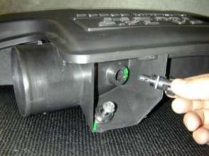 Remove the inlet air temperature (IAT) sensor from the upper resonator by