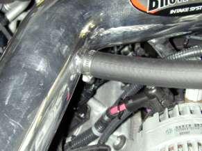 Install the air filter onto the end of the AEM inlet pipe (end furthest from the