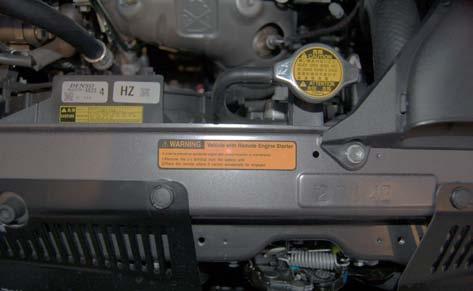 Clear Tape Fig. 5-1 5. Tags and Labels. For US Vehicles use the English Tags and Labels, and discard the Spanish Tags and Labels.