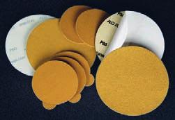 Gold A/O Stearated Discs with Tabs PSA - E Weight Tab Style mineral, resin bond and tough tear resistant E weight paper. Excellent for metal, painted surfaces and wood. Special coating resist loading.