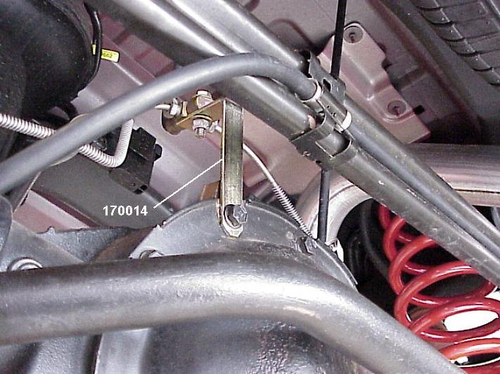2) Attach new Rancho shock absorbers to the upper and lower mounts.