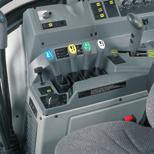 In tractors equipped with the electronic Forward-Reverse Shuttle, the shuttle lever is located