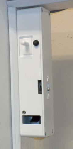 The interlock keeper is mounted on the inside of the door such that it latches with the interlock when the door is closed.