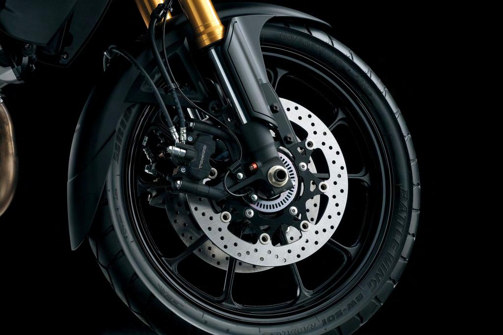 Brakes New Tokico mono-block radial mount front brake calipers, each with 4 opposed front brake