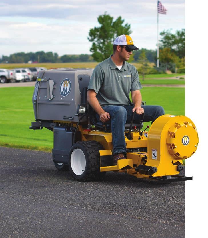 The Loader Bucket has a high-strength steel cutting edge with tilting action, and is powered by a 500-lb electric ram. It is available for use on each Walker Mower except models B and H.