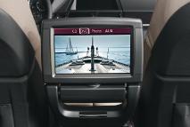 The system features a fold-down 8-inch color screen and can be controlled via a wireless remote control