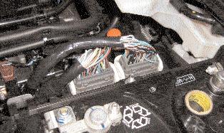REPLACE WITH 4-PIN CRUISE BRAKE SWITCH SUP- PLIED IN KIT. PIN 23 WHITE WIRE 2. CAUTION: PRESS IN THE BRAKE PEDAL AND HOLD.