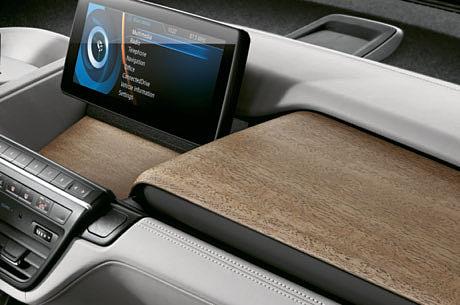 The aesthetically arresting combination of matt wood plus soft leather and wool is unique in the automotive world.