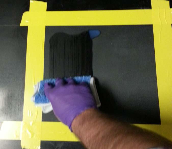 Using the blue Scotchgard Floor Protector Applicator Pad, coat the tile evenly using as little pressure as possible
