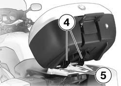 Pull handle 3 up as far as it will go. Lift the topcase at the rear and pull it off the luggage carrier.